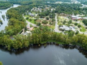 A drone image of the Rotary Wheel Garden from over Greenfield Lake. The Amphitheater is at lower left.